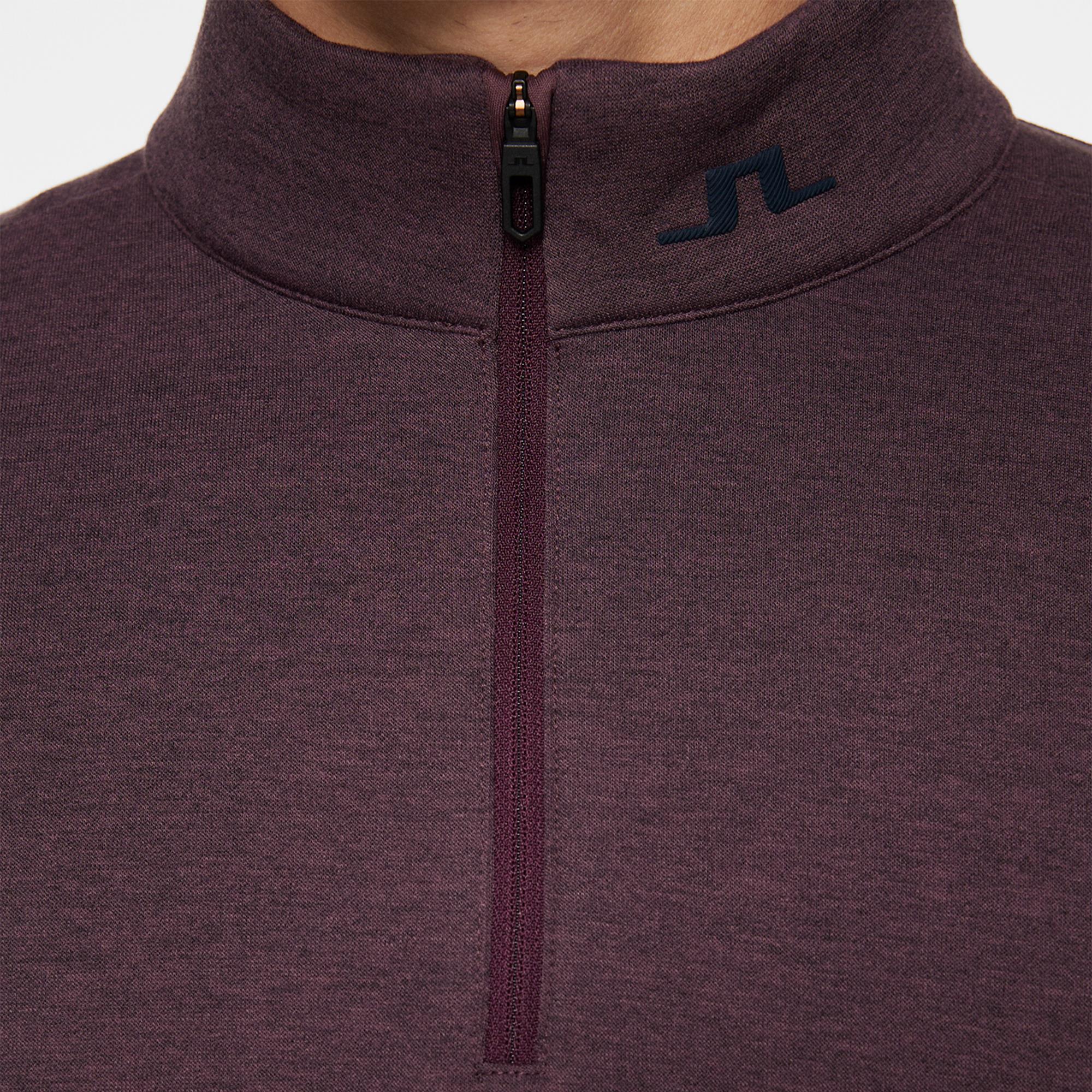 JL logo on collar and zip close-up – Heath Strike Men's Golf Mid Layer